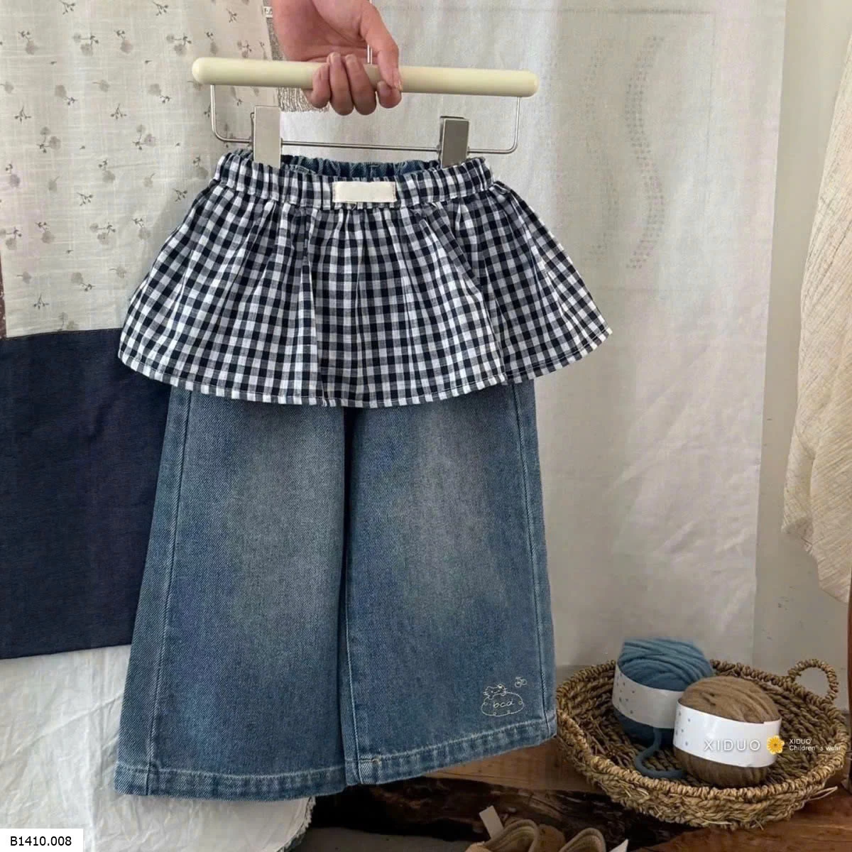 QUẦN JEANS PHỐI VÁY KẺ CARO    Giá sỉ 140k