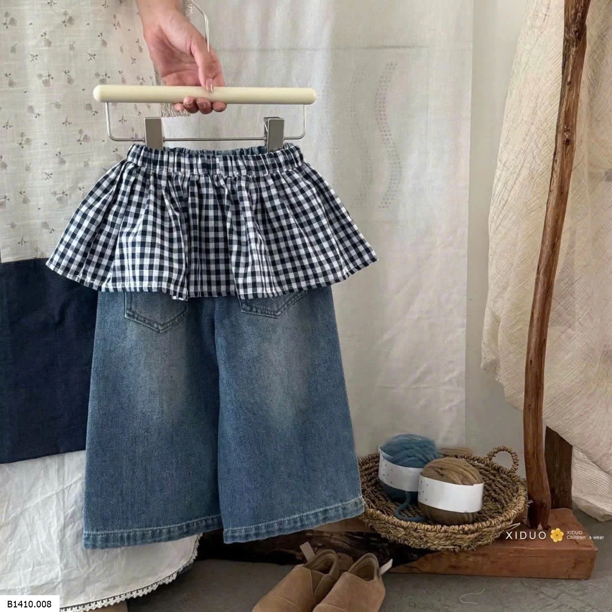 QUẦN JEANS PHỐI VÁY KẺ CARO    Giá sỉ 140k